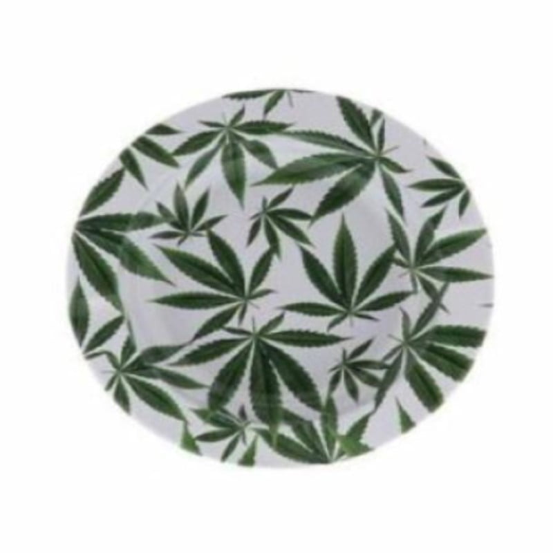 An image of a metal ashtray adorned with cannabis leaf designs, a stylish accessory for ash and butt disposal in a cannabis-themed setting.