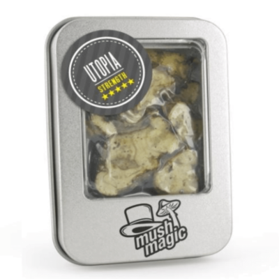 An image showcasing Utopia Magic Truffles from Mush Magic, a product containing magic truffles, emphasizing the packaging and its potential for a psychedelic experience.